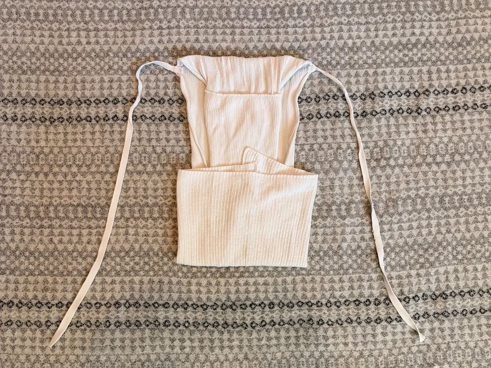 Step 5: The bottom of the narrowed nappy folded up.